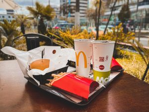 Why your migraine might be making you crave a large Coke and fries