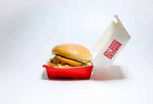 The UK is introducing restrictions on junk food ads from January – but there are problems