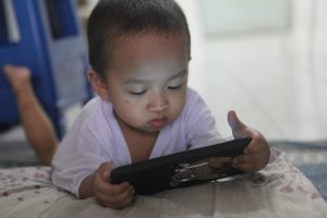Kids are trying to swipe physical books like tablets. The UK Government says enough is enough